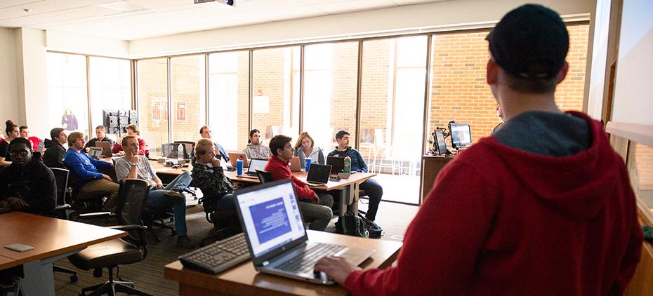 Student giving a presentation in class